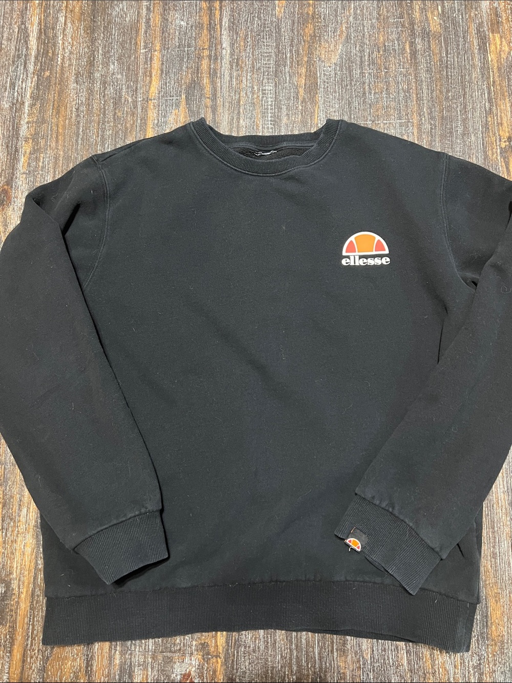 Ellesse Black Tee with Orange and Red Logo